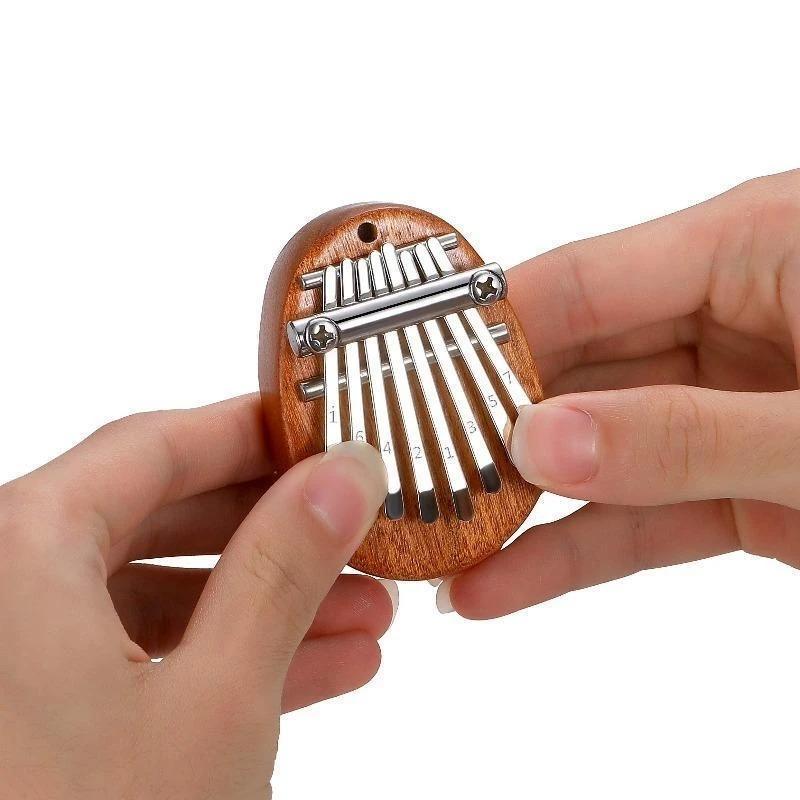 (CHRISTMAS PRE SALE - 50% OFF)MINI THUMB PIANO